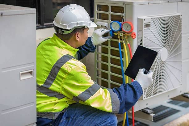 Professional Heat Pump Repair technician working in Harwick, PA